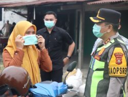 Kapolres Musi Rawas Terjun Langsung Pimpin Pengaturan Lalu Lintas Pagi dan Bagikan Masker